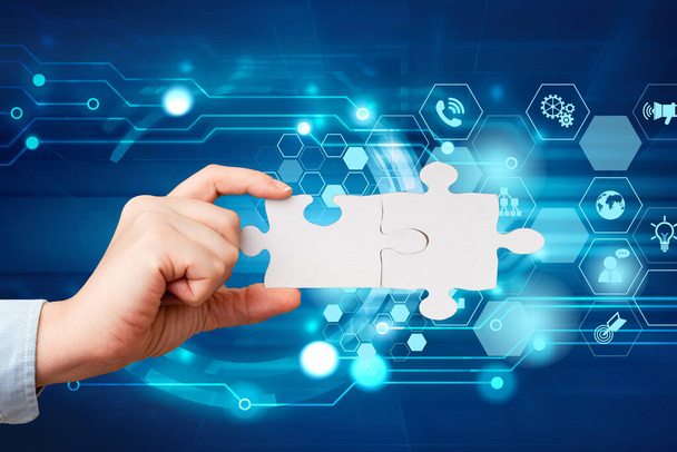 Hand Holding Jigsaw Puzzle Piece Unlocking New Futuristic Technologies. Palm Carrying Puzzles Part Displaying Solving Late Innovative Virtual Ideas. - Photo, Image