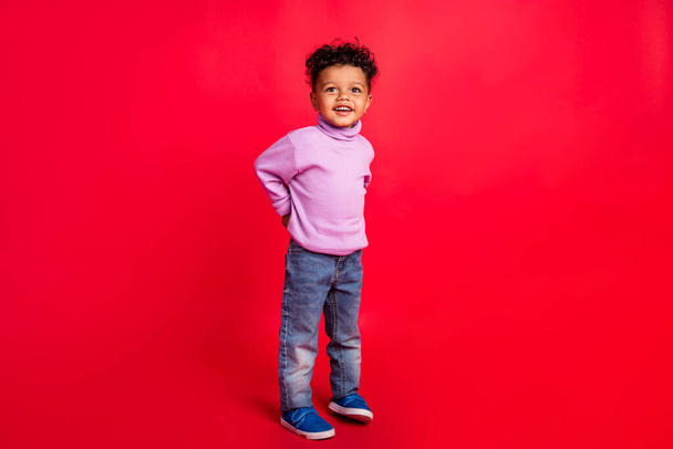 Full length body size view of attractive cheerful preteen guy good mood isolated over bright red color background - Fotografie, Obrázek