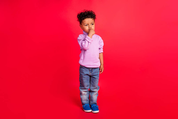 Full length body size view of attractive minded serious preteen guy overthinking isolated over bright red color background - Fotografie, Obrázek