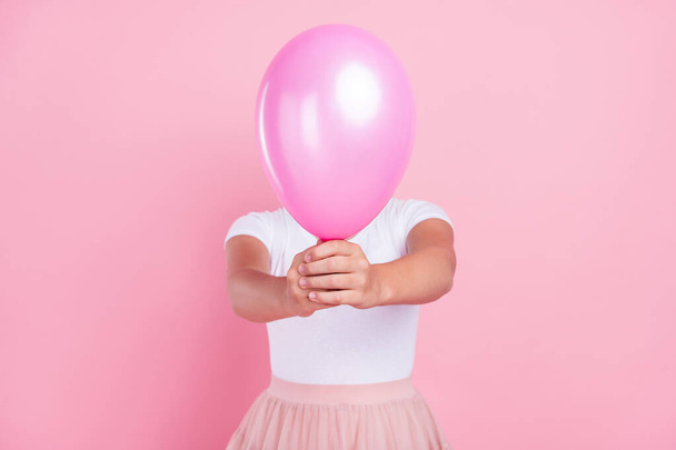 Photo of young girl close cover face air balloon anonym incognito isolated over pastel color background - Fotografie, Obrázek