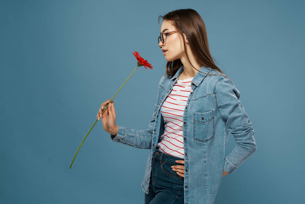 pretty brunette with glasses red flower denim jacket elegance romance - Fotografie, Obrázek