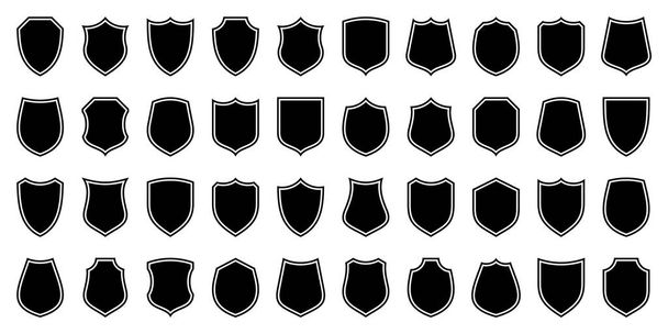 Set of various vintage shield icons. Black outlined heraldic shields. Protection and security symbol, label. Vector illustration. - Vector, Image
