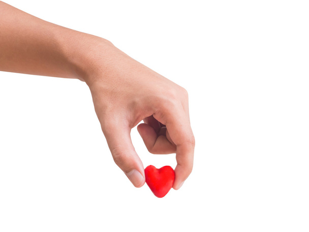 Recoger la mano corazón rojo
 - Foto, imagen