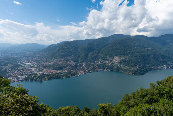 Beautiful view over Lake Como and the city of Tavernola, Lombardy, Italy. The view is seen from the small village of Brunate, above the city of Como. It is a sunny, summer day - Photo, Image