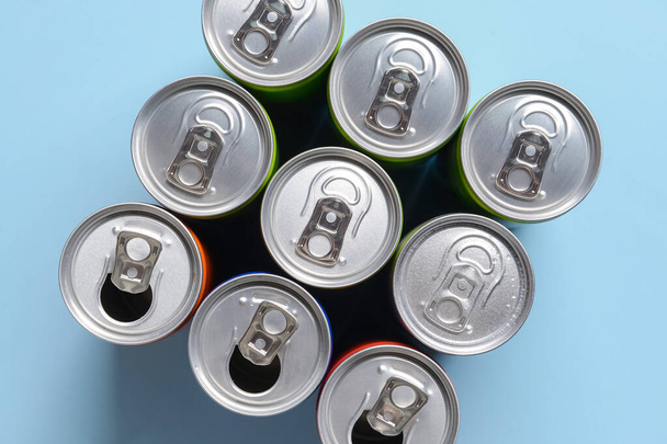 Cans of soda on color background - Photo, Image