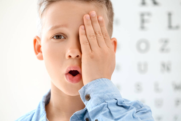 Little boy undergoing eye test in clinic - Photo, Image
