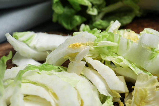 Fresh cut chinese cabbage on table, closeup - Photo, Image