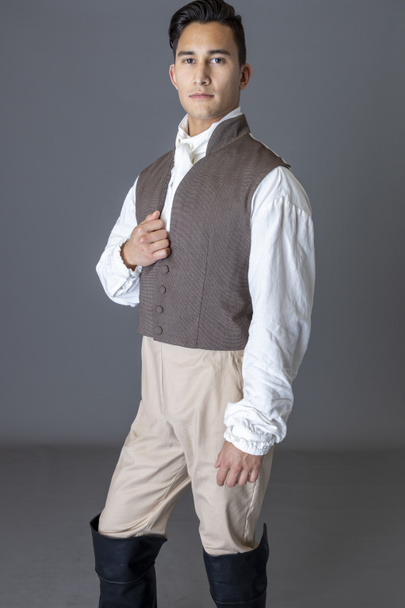 A Regency gentleman standing against a grey studio backdrop - Photo, Image