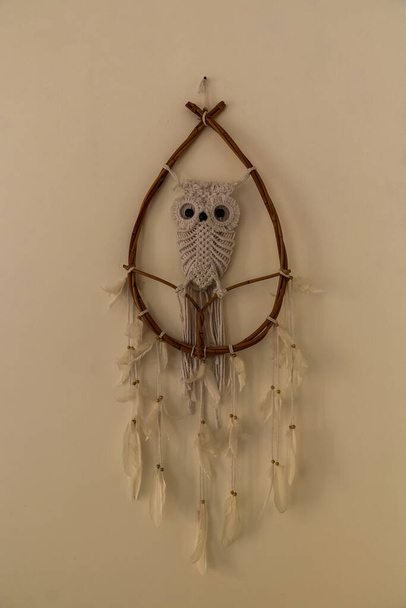 Owl dream catcher with wooden on white background - 写真・画像