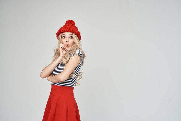 blonde in a striped T-shirt Red Hat cropped view glamor - Foto, Imagen