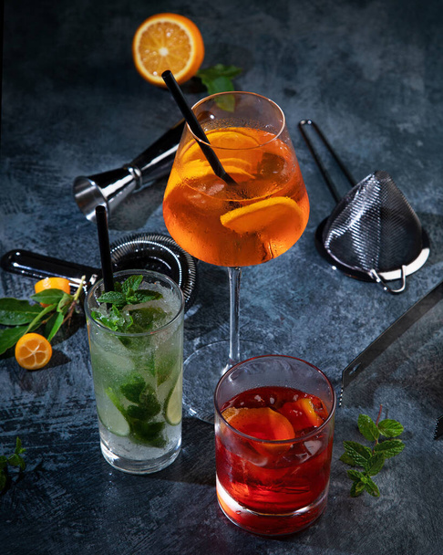 Cocktails assortment served on dark background. Classic drink menu concept.  - 写真・画像