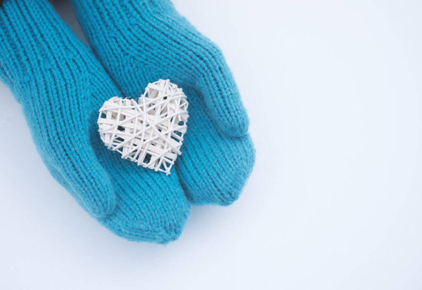 Female hands in mittens with heart, close-up - Photo, Image