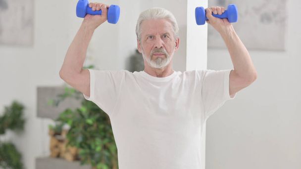 Close up of Loving Old Man doing Exercise with Dumbbells - Photo, Image