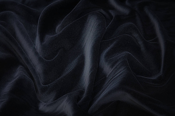 Gros plan texture de tissu gris naturel ou tissu de couleur grise. Texture de tissu de coton naturel ou de tissu de lin. Fond toile gris. - Photo, image