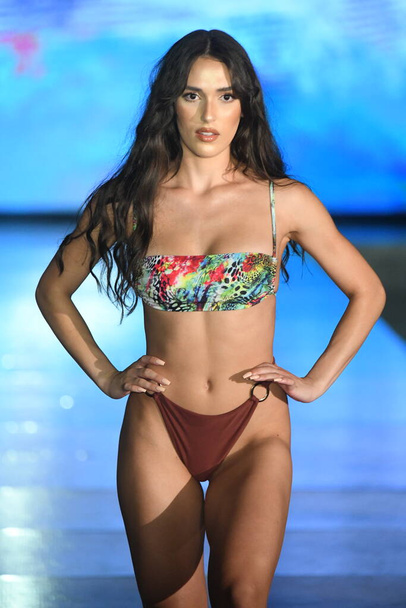 MIAMI BEACH, FLORIDA - JULY 10: A model walks the runway for Breezy Swimwear Show during Miami Swim Week The Shows powered by DCSW on July 10, 2021 in Miami Beach, Florida - Φωτογραφία, εικόνα