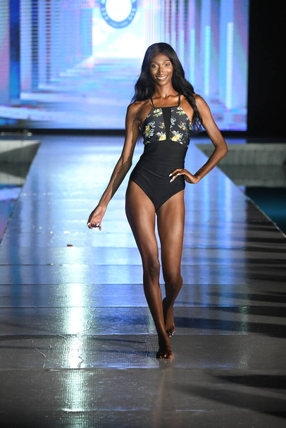 MIAMI BEACH, FLORIDA - JULY 10: A model walks the runway for Relleciga Show during Miami Swim Week The Shows powered by DCSW on July 10, 2021 in Miami Beach, Florida - Photo, Image
