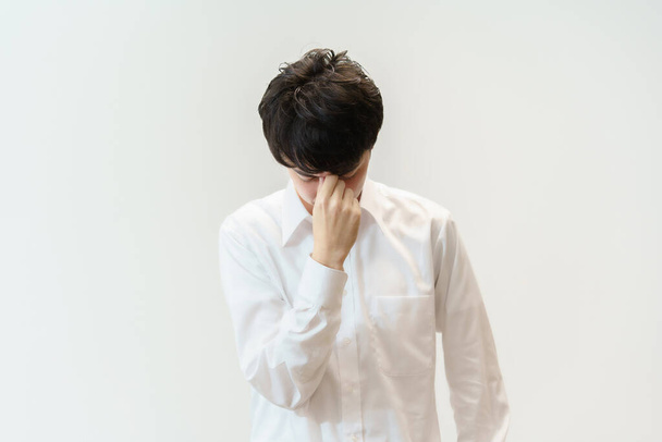 Aasialainen mies kärsii päänsärky - Valokuva, kuva