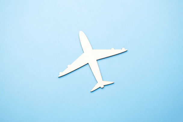 model of passenger plane on blue background - Foto, Imagem