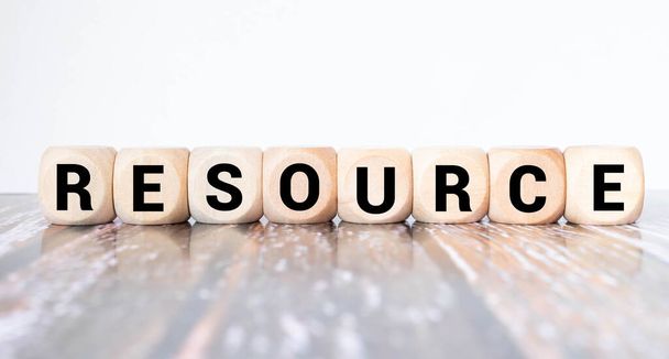 Resources sign on a wooden table in an office. - Photo, Image