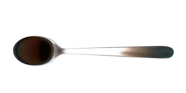 Soy sauce in spoon isolated - Foto, Bild