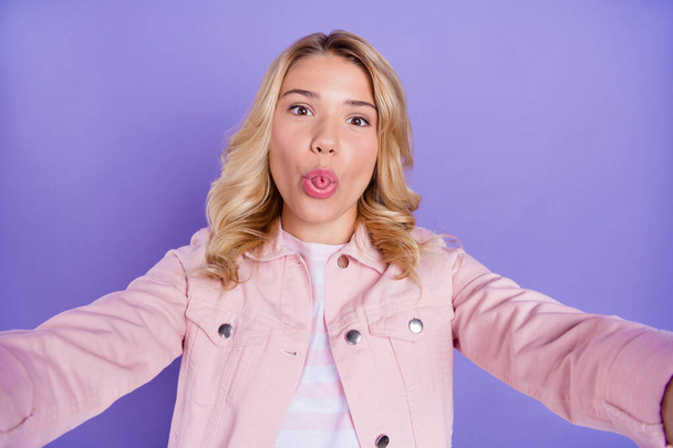 Photo of carefree excited person take selfie tongue out have good mood isolated on purple color background - Fotoğraf, Görsel