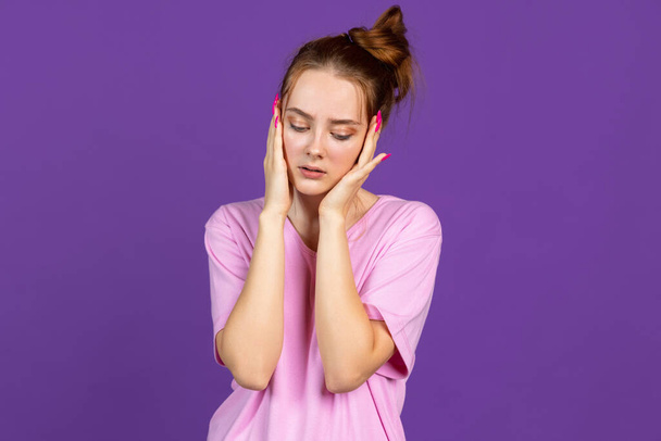 Half-length portrait of young pretty girl isolated on purple, lilac color studio background. Concept of human emotions, facial expression, natural beauty, youth - Φωτογραφία, εικόνα