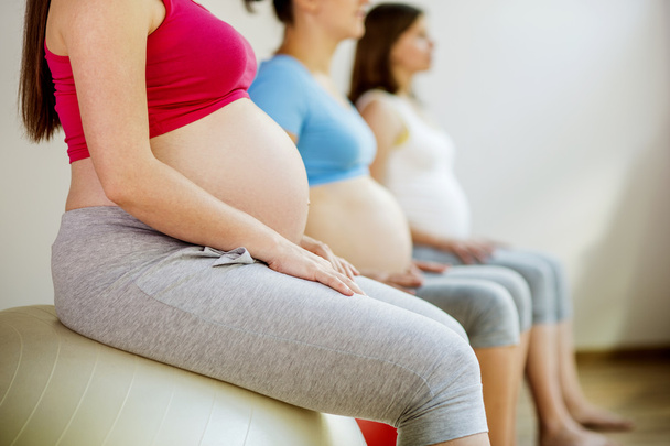 Pregnant women doing exercise - Foto, Imagem
