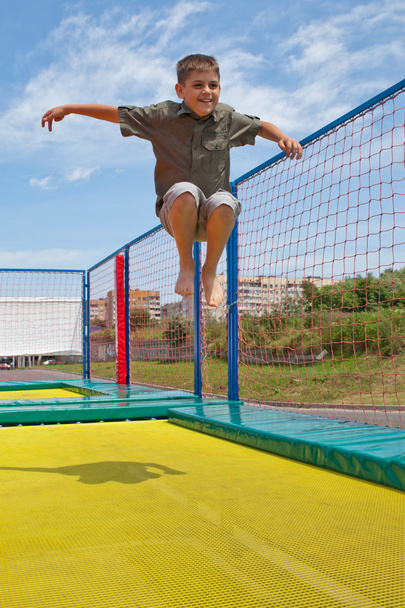Child on a trampoline - Zdjęcie, obraz