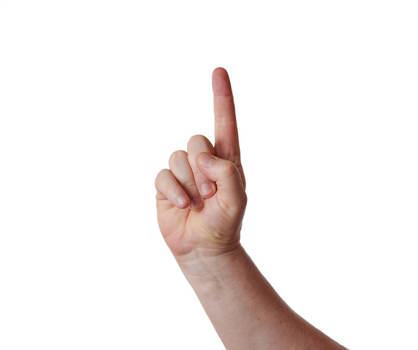 Man hand met opgeheven wijsvinger op witte achtergrond - Foto, afbeelding