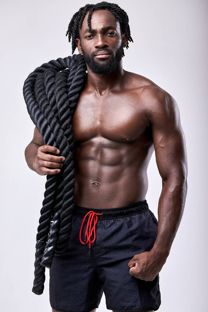 Serious african guy bare-chested muscular sportsman isolated on white background - Φωτογραφία, εικόνα