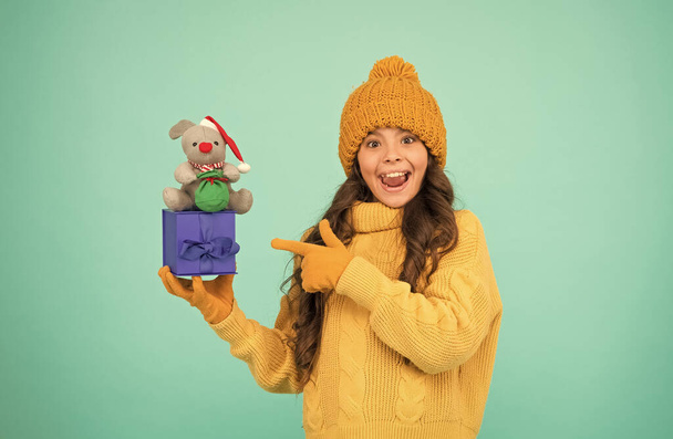 In shopping store. happy new 2020 year. rat symbol of year. small happy girl hold mouse. kid knitted sweater and hat play plush toy. toy shop for kids. christmas presents online. get ready for xmas - Fotoğraf, Görsel