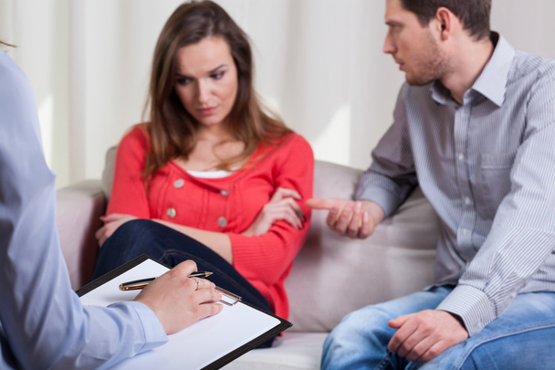 Man trying to talk with his wife on therapy - Photo, Image