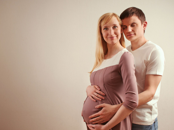 Happy sensual couple expecting a baby  - Fotoğraf, Görsel
