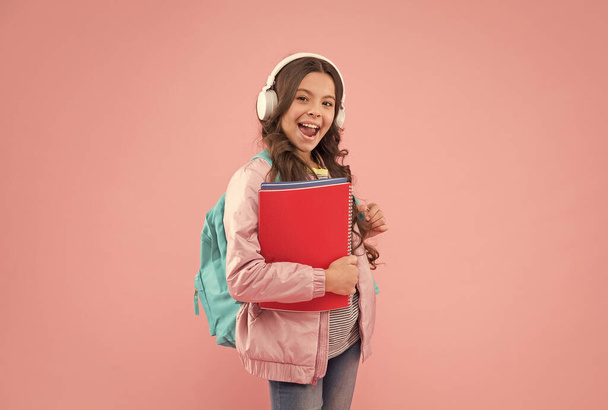 Quality education is with english school tradition. Happy girl back to school. Music education. Home schooling. Private teaching. New technology. Learn the language you want - Foto, afbeelding