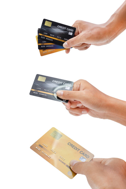 Tarjeta de crédito de mano aislada sobre fondo blanco - recorte de rutas
. - Foto, imagen