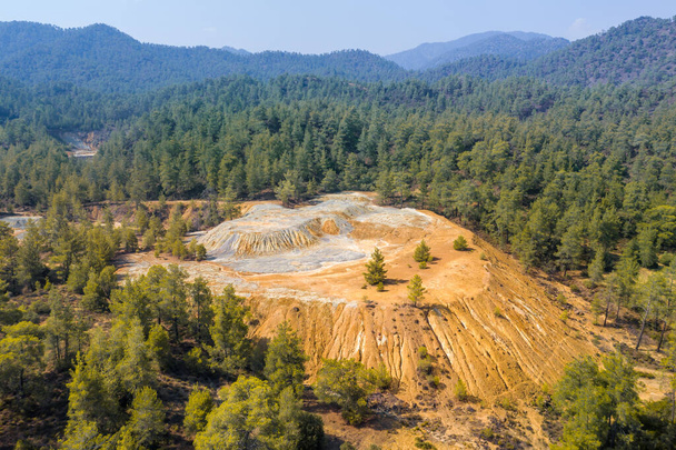 Colorful mine tailings from pyrite ore extraction in Troodos mountains, Cyprus. Aerial panorama - Photo, Image