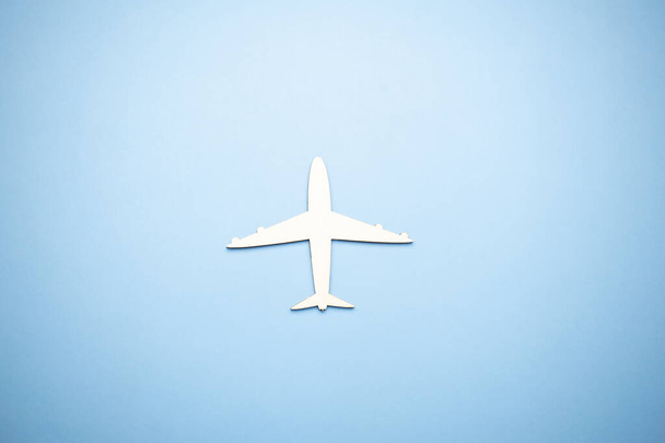 model of passenger plane on blue background - Zdjęcie, obraz