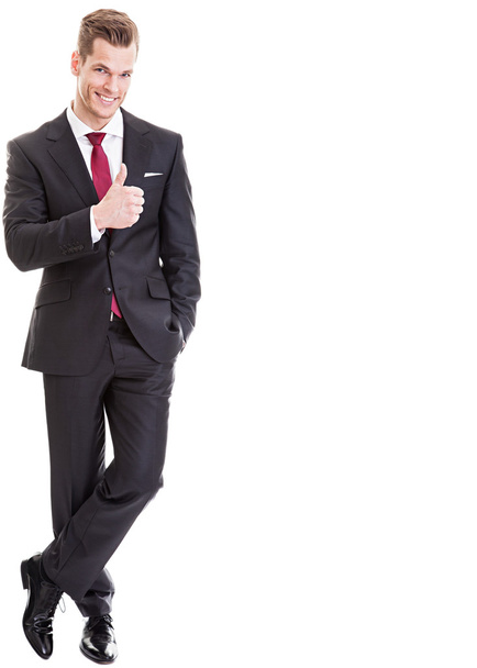 Full-length portrait of business man who thumbs up - Photo, Image