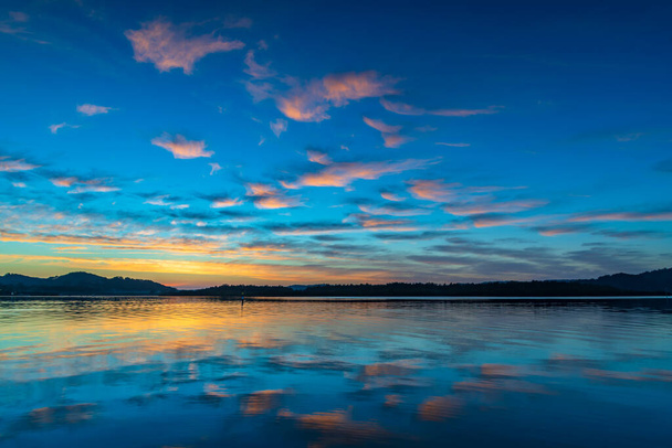 Sunrise waterscape with clouds over Brisbane Waters in Woy Woy on the Central Coast, NSW, Australia. - Фото, зображення