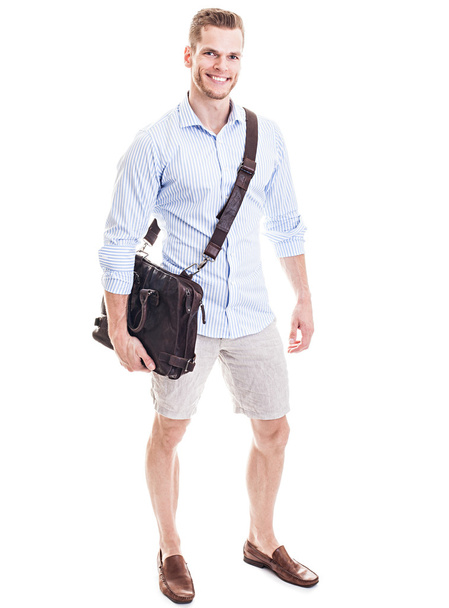 Bello studente giovane con borsa per computer portatile isolato su dorso bianco
 - Foto, immagini