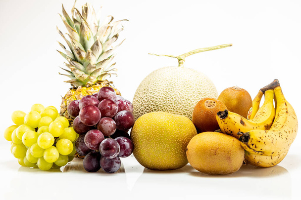 Group photo of fruits taken on a white background - Valokuva, kuva