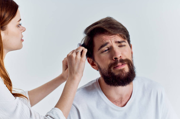 bearded man with hairdresser fashionable hairstyle close up - Foto, imagen