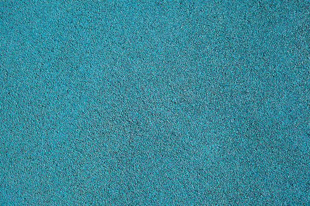 Háttér textúra a kék morzsa gumi használt atlétikai pályák és játszóterek - Fotó, kép