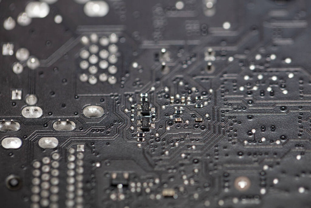 Closeup of fragments of motherboard bakground - Photo, Image