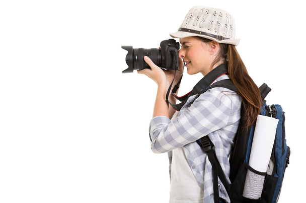 Young woman using digital camera - Zdjęcie, obraz