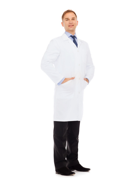 smiling male doctor in white coat - Фото, изображение