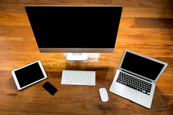 Computer ,laptop , tablet , smart phone on wood table - Foto, Imagem