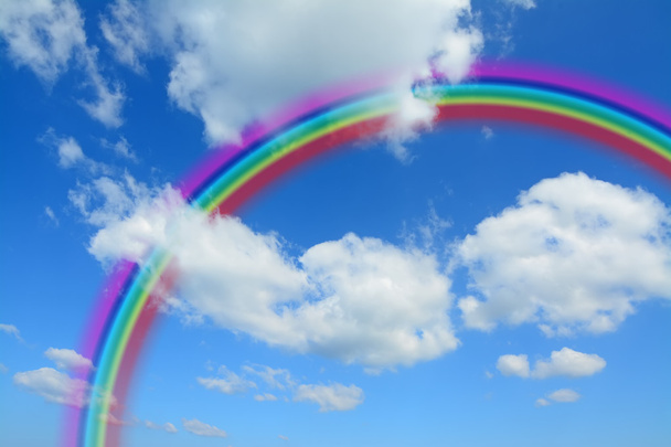 fluffy clouds and rainbow - Photo, Image