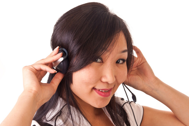 Asian girl with headset 2 - Photo, Image