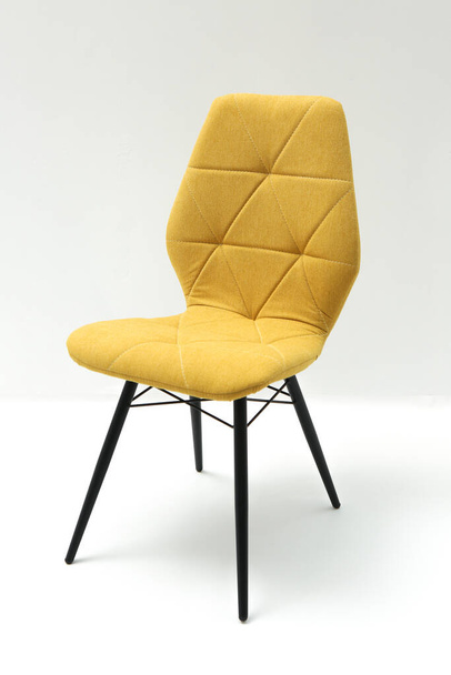 Yellow soft chair on an isolated white background.  - Valokuva, kuva